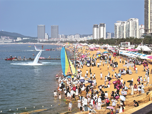 金沙乐娱场威海高区两大海水浴场开启“海澡季”(图1)